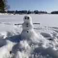 Mini Snow Man at the end of our Dock